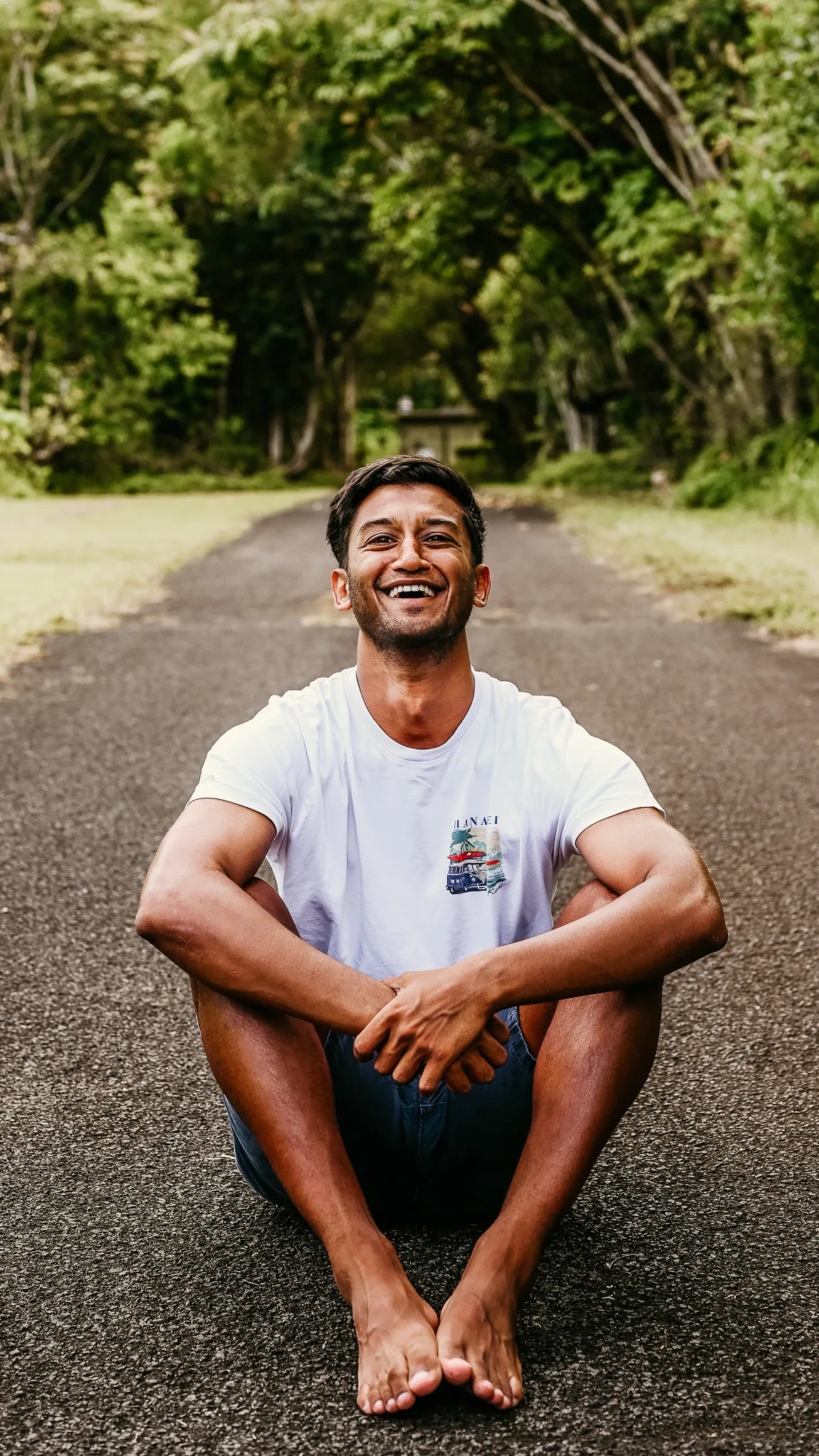 Rafat Khan, founder of Tribe, on a tree-lined path