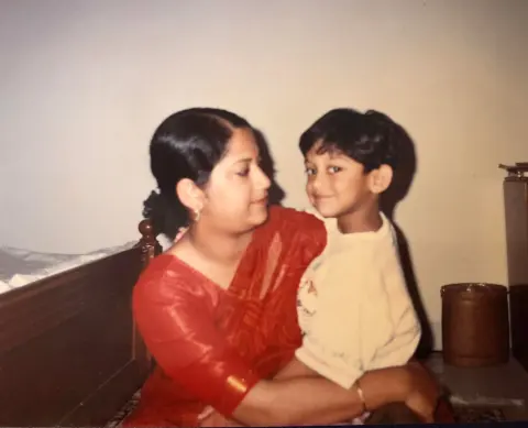 Rafat as a child with his mother in Dhaka, Bangladesh